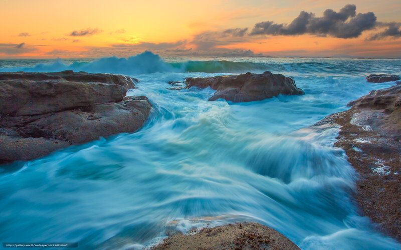 Ocean waves at sunset