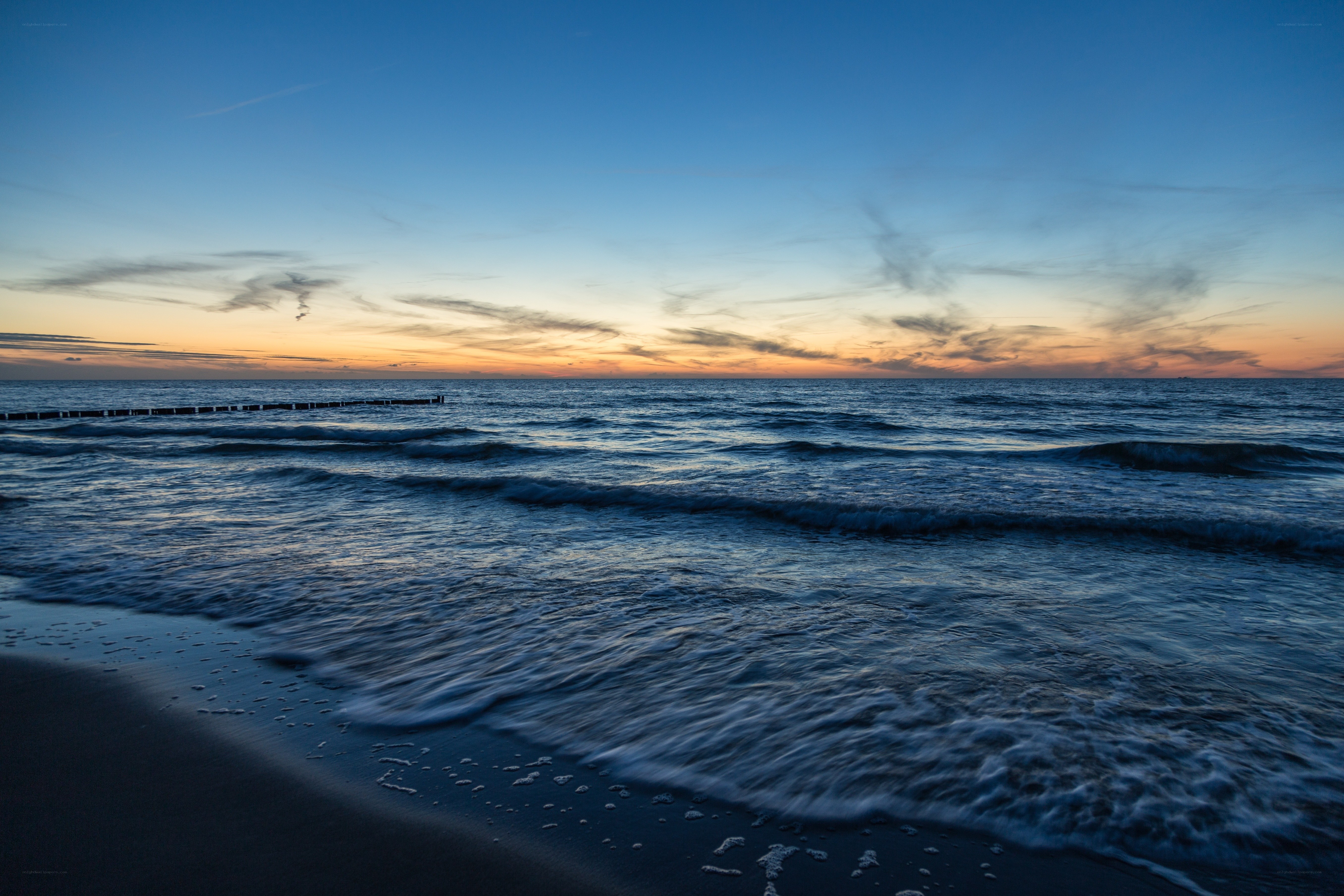Ocean waves at sunset