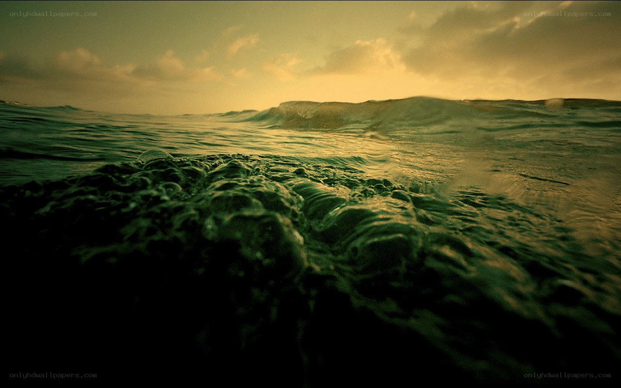 Ocean waves at sunset