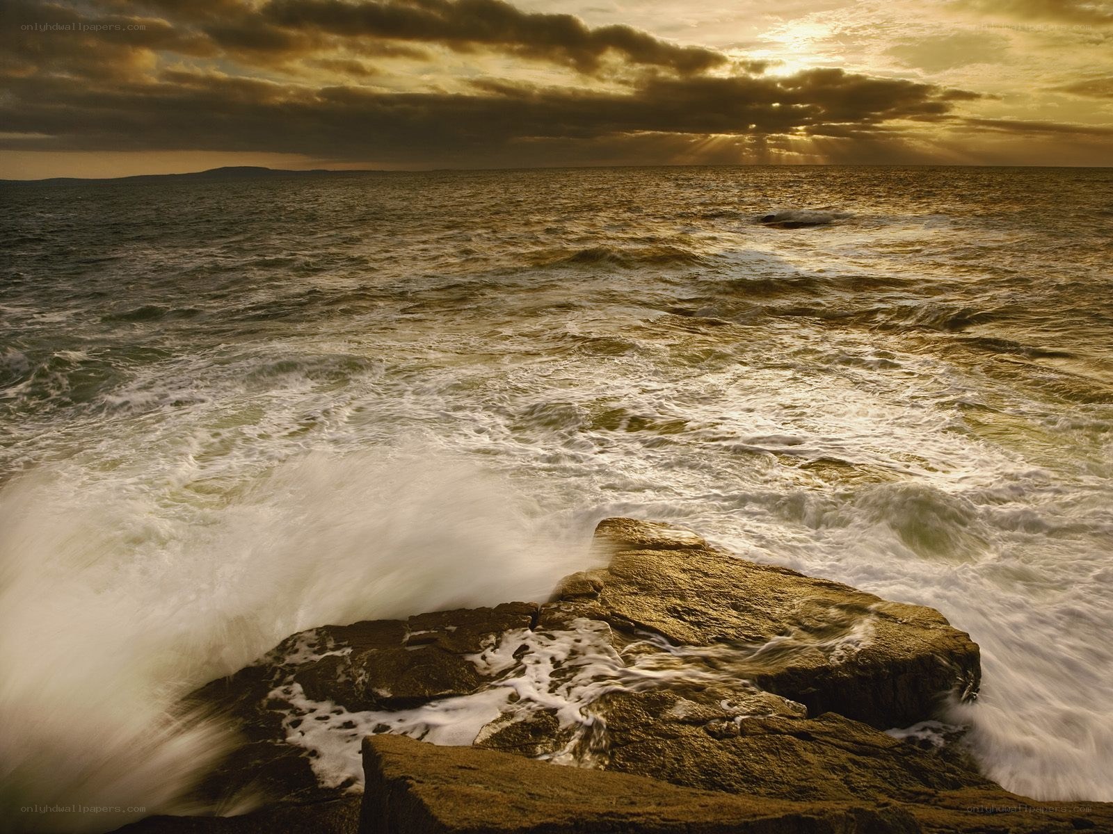 Ocean waves at sunset