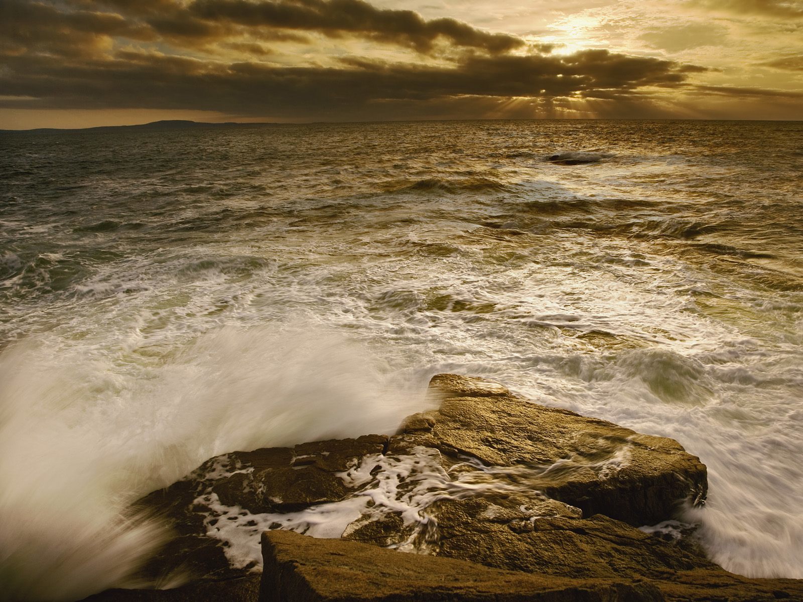 Ocean waves at sunset