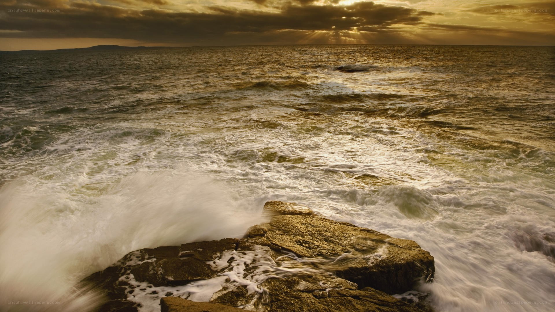 Ocean waves at sunset
