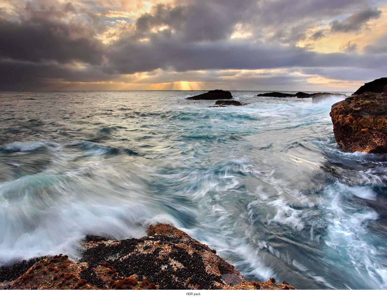 Ocean waves at sunset