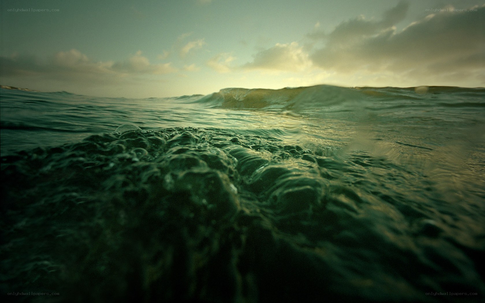 ocean waves at sunset