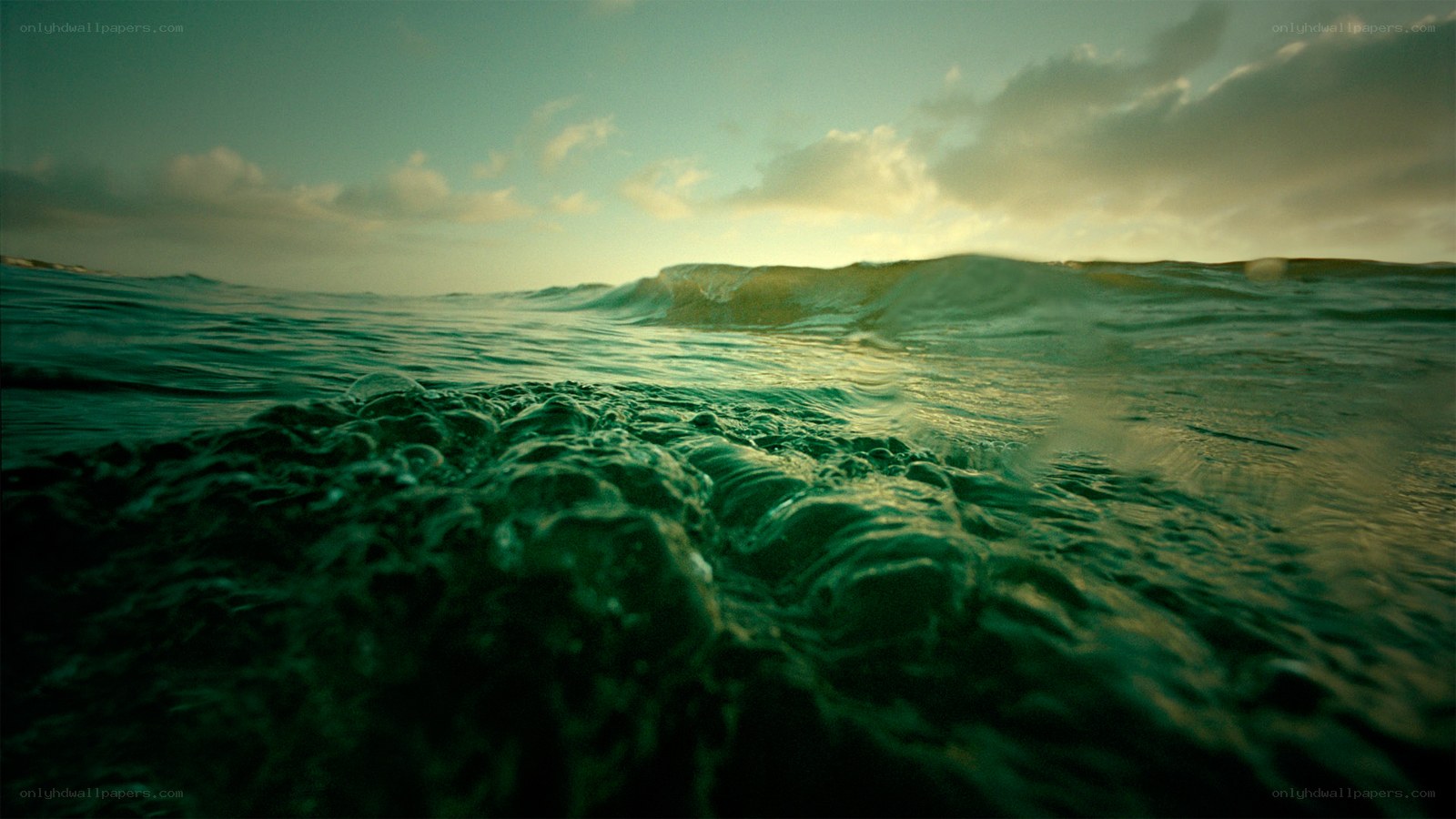 ocean waves at sunset