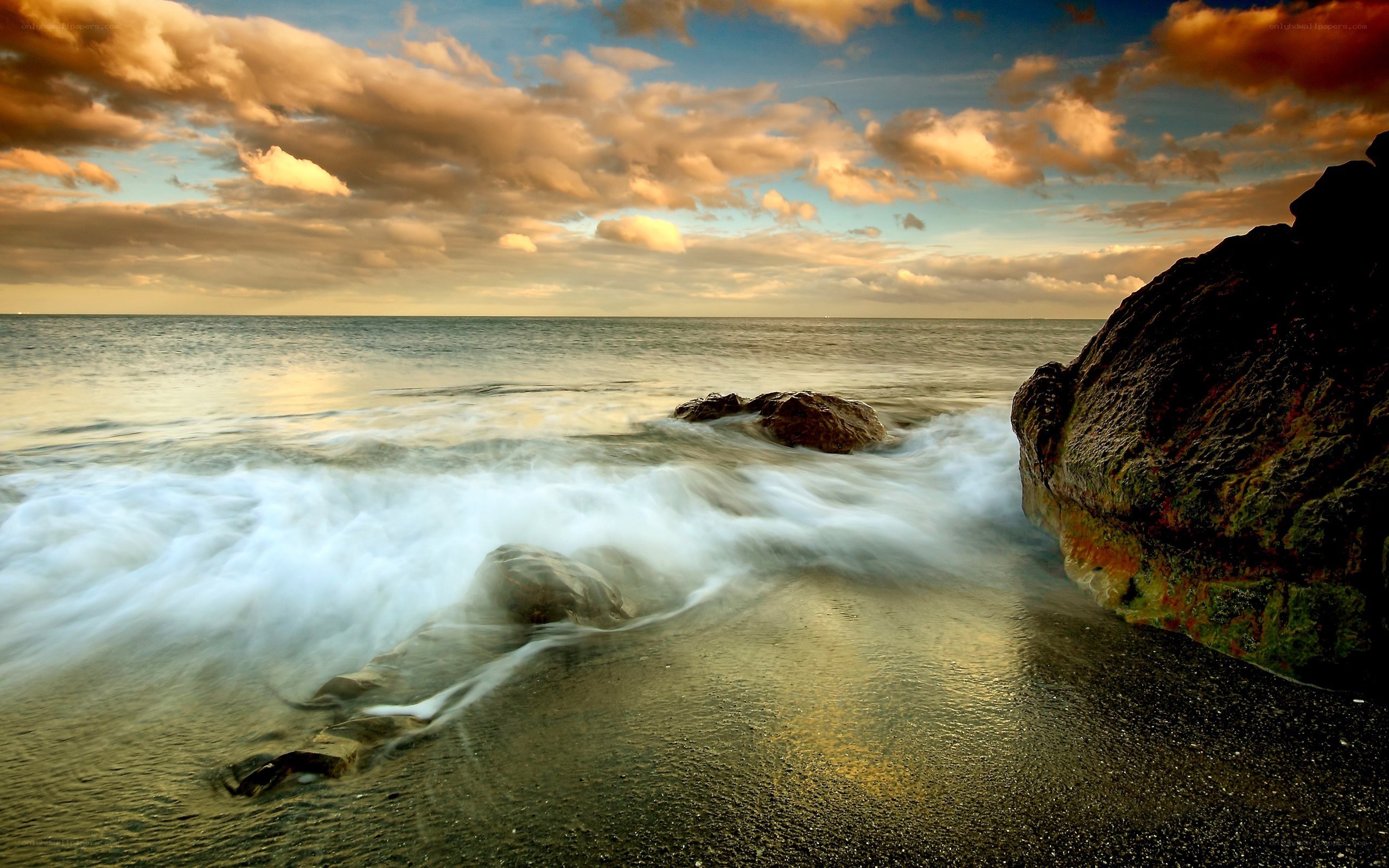 Ocean waves at sunset