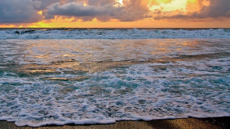 Ocean waves at sunset