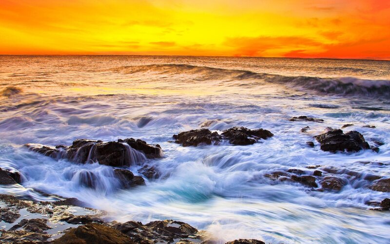 Ocean waves at sunset