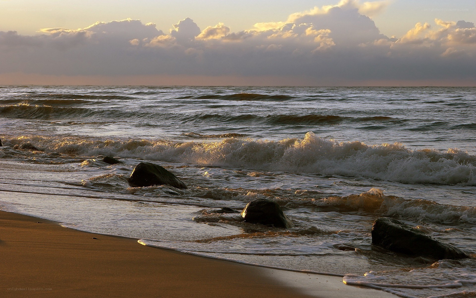 Ocean waves at sunset