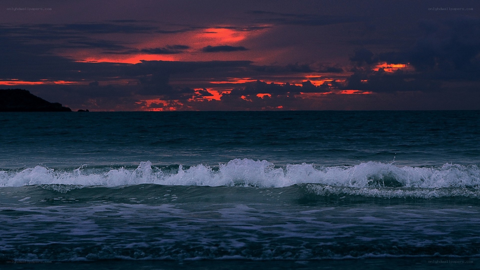 Ocean waves at sunset