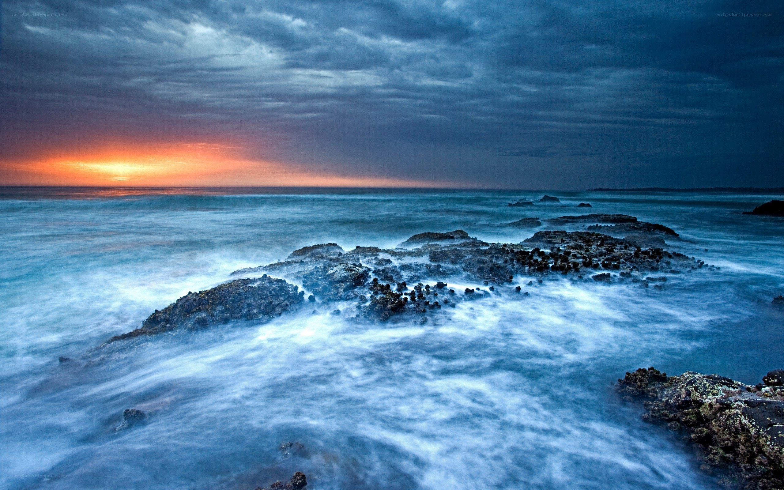 Ocean waves at sunset