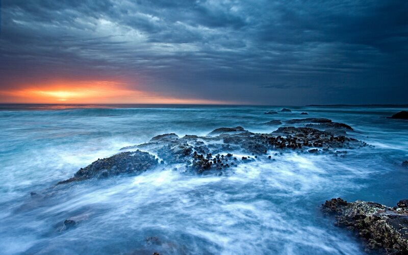 Ocean waves at sunset