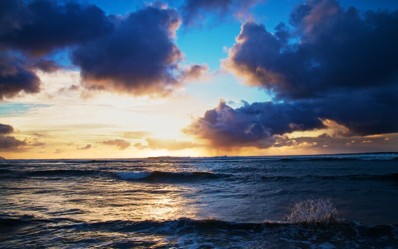 Ocean waves at sunset