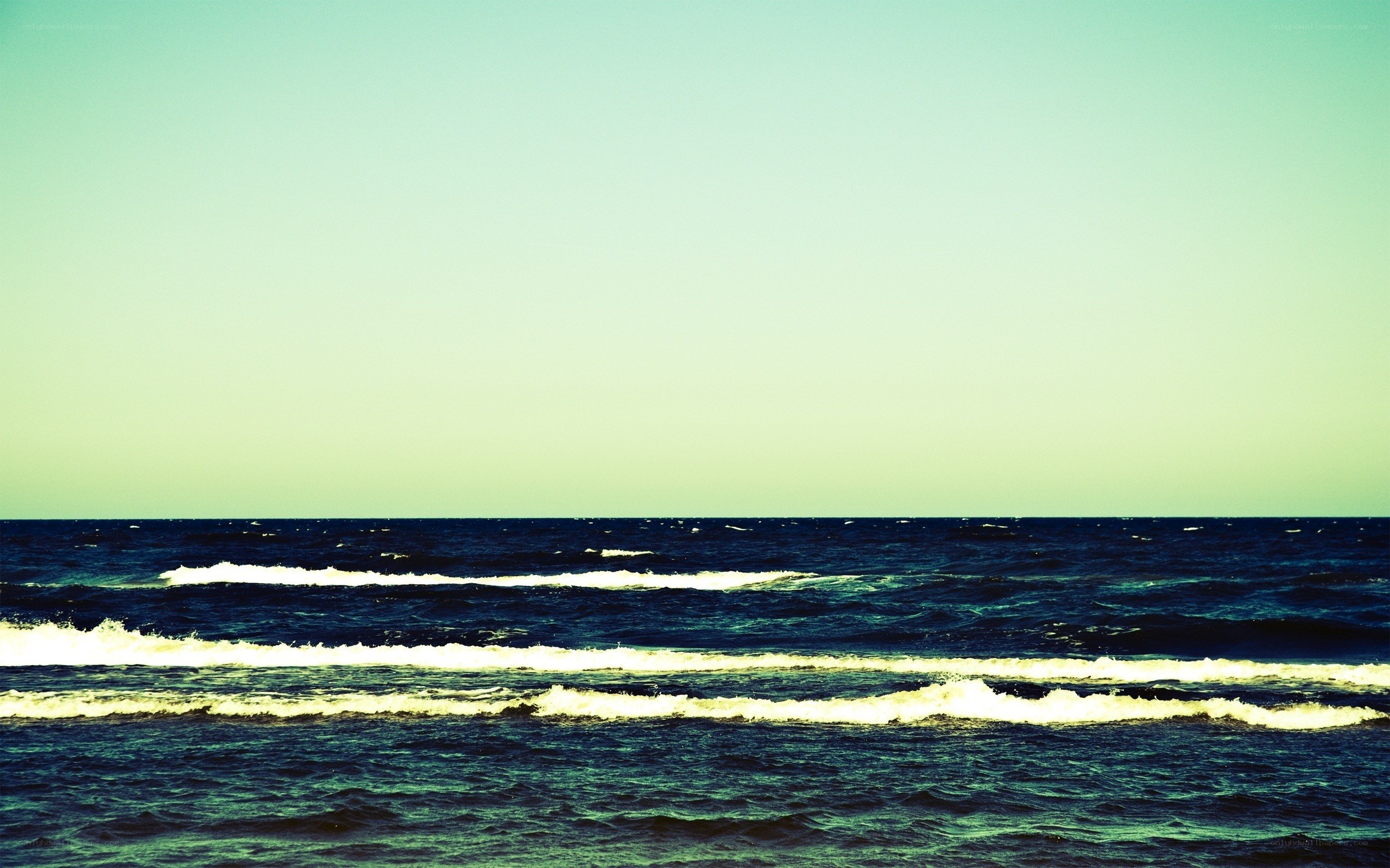 Ocean waves at sunset