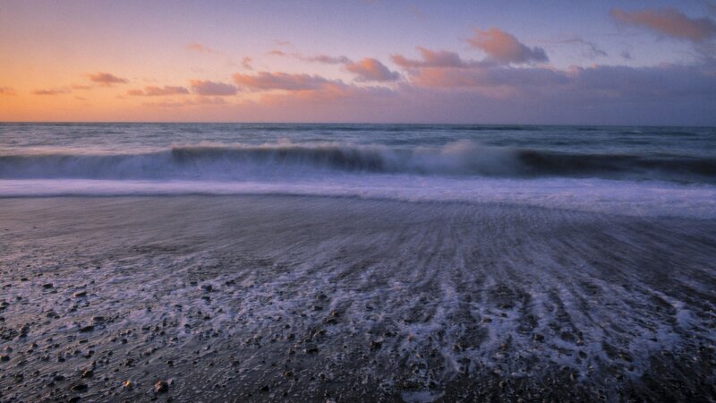 Ocean waves at sunset