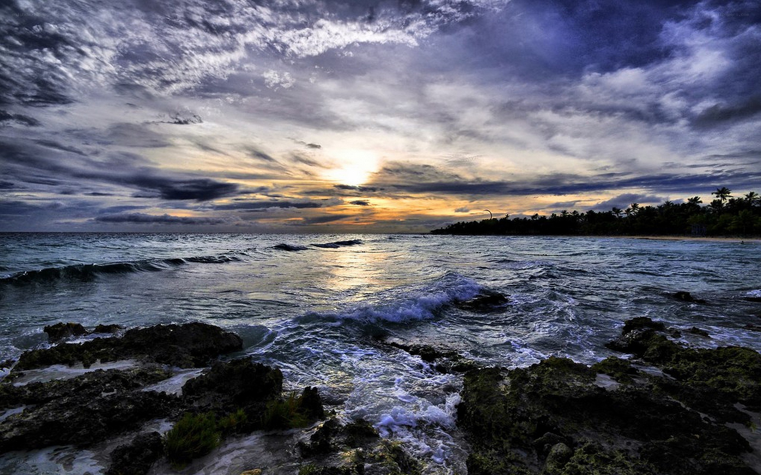 Ocean waves at sunset