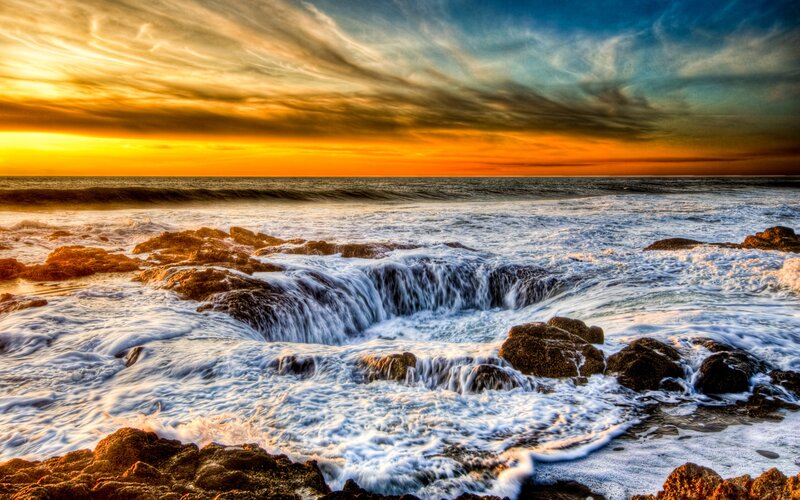 Ocean waves at sunset