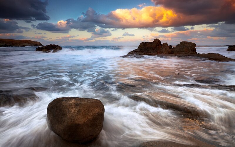 Ocean waves at sunset