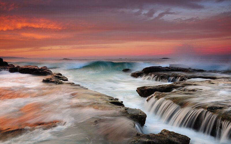 Ocean waves at sunset