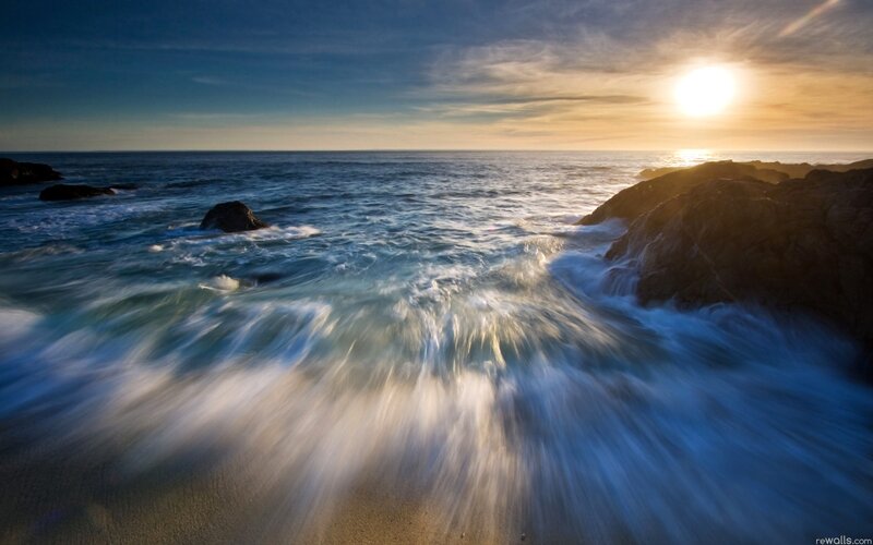 Ocean waves at sunset
