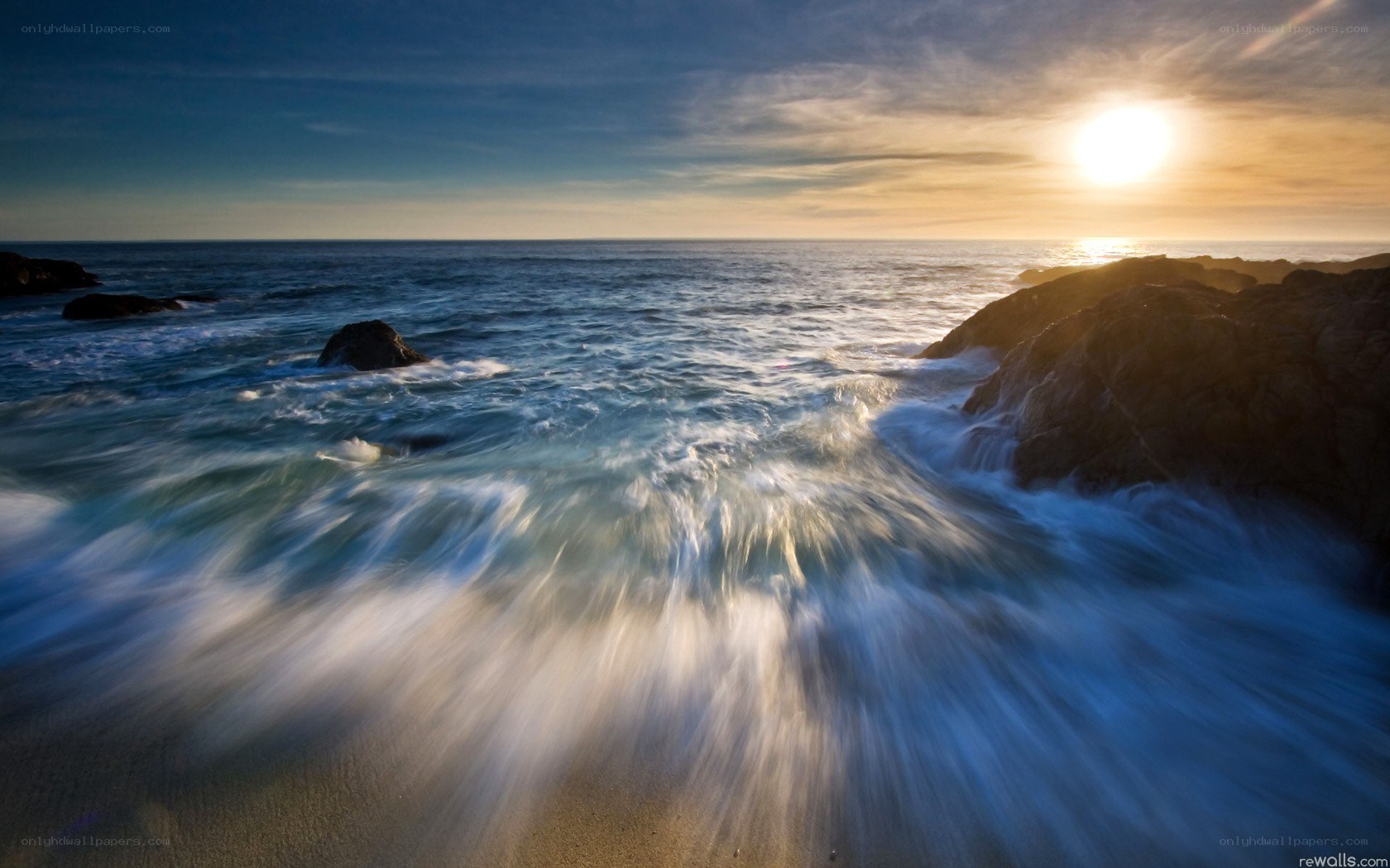 Ocean waves at sunset