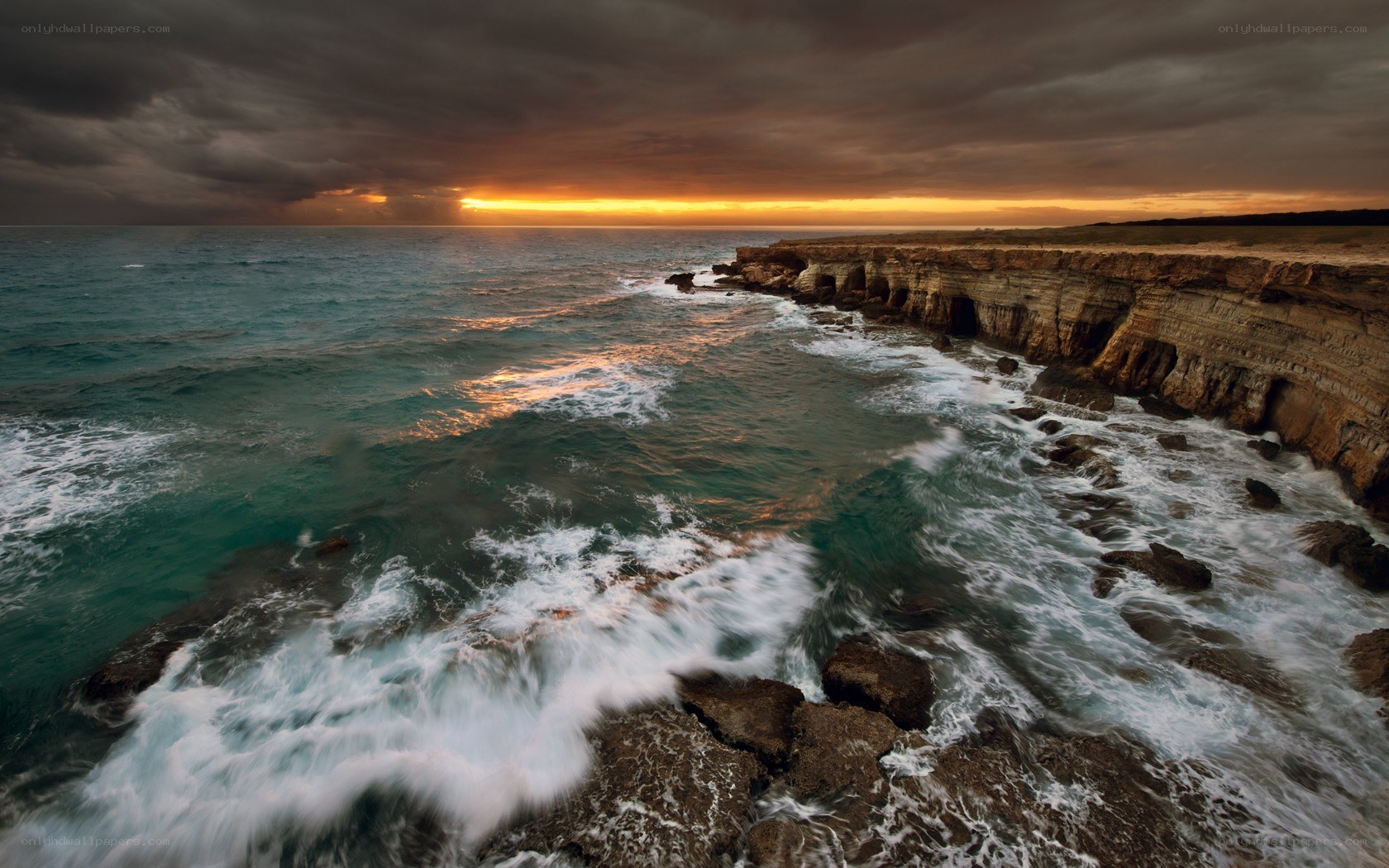 Ocean waves at sunset