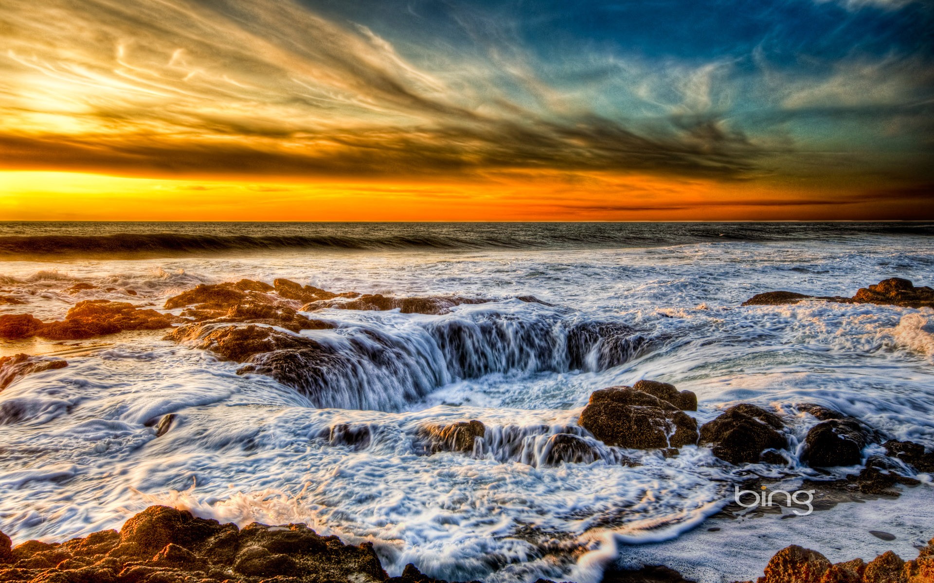 Ocean waves at sunset