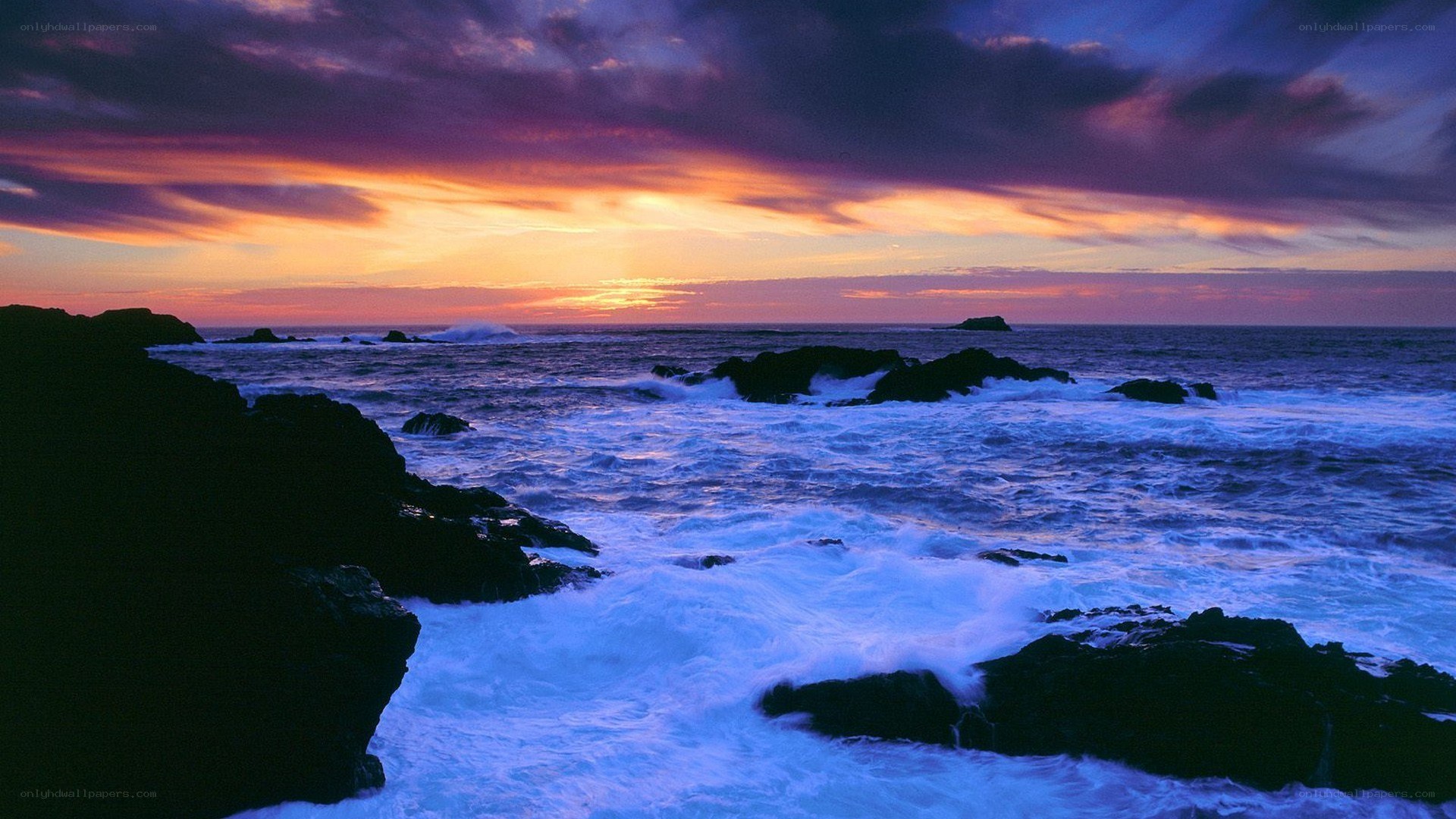 Ocean waves at sunset