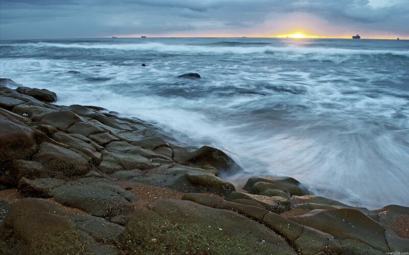 Ocean waves at sunset