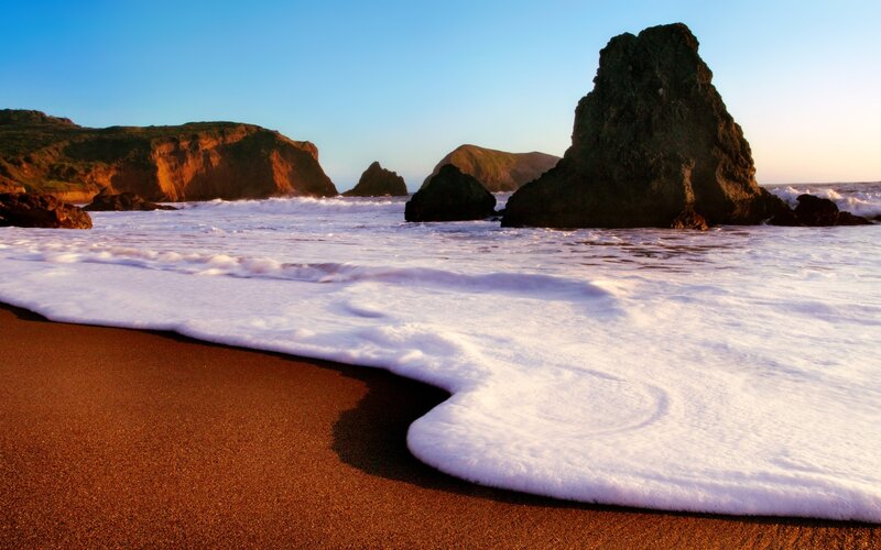 Ocean waves at sunset