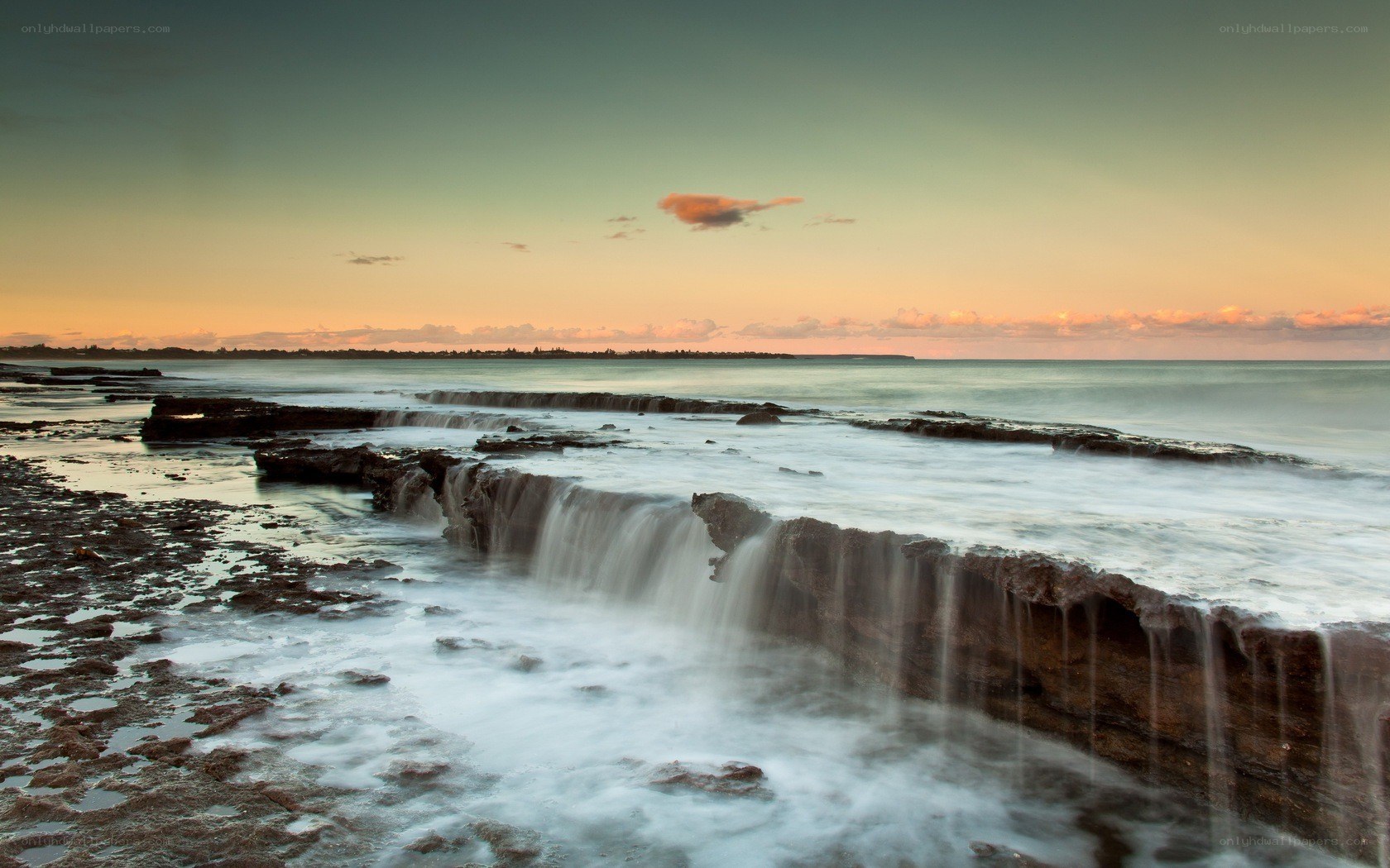 Ocean waves at sunset