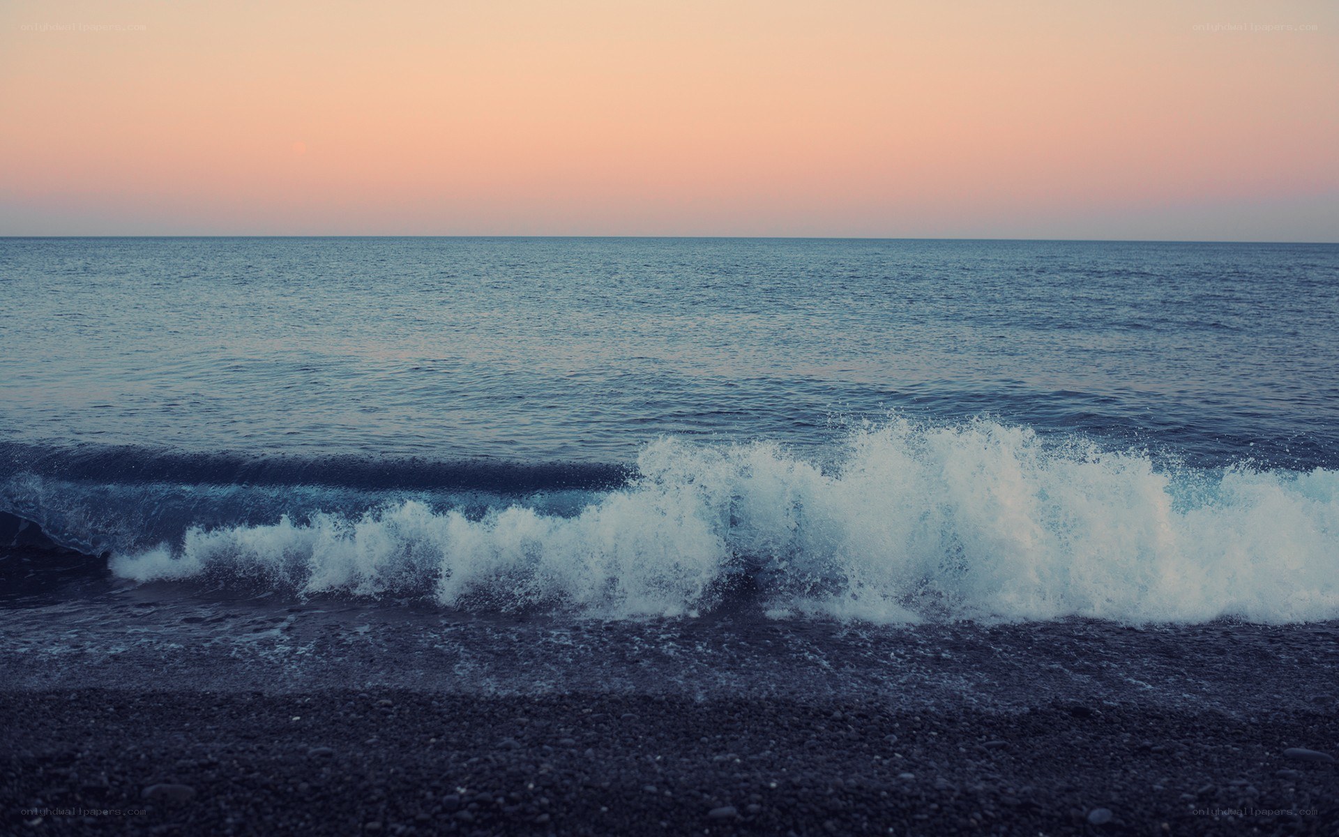 Ocean waves at sunset