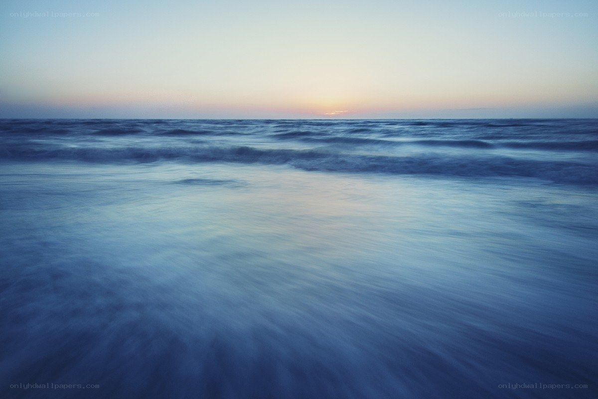 Ocean waves at sunset