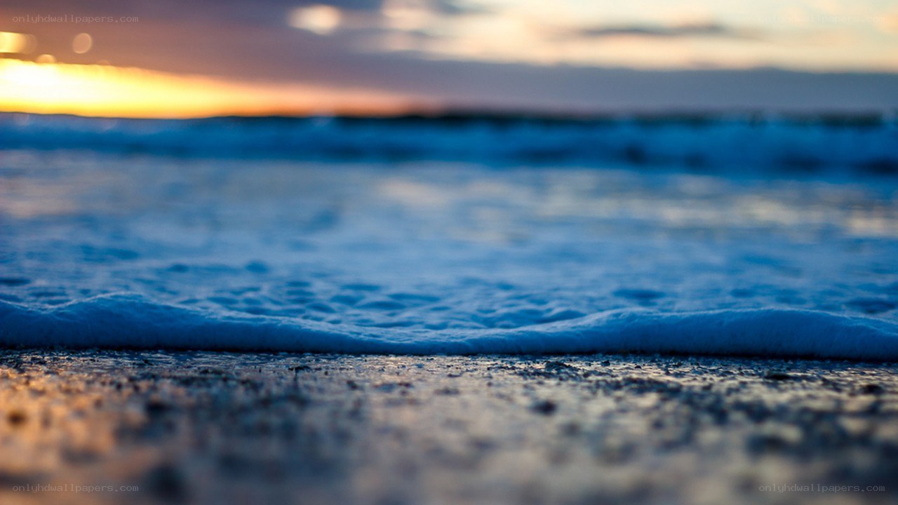 Ocean waves at sunset