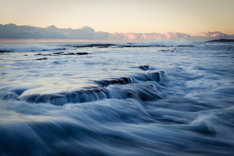 Ocean waves at sunset