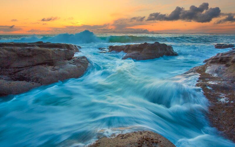 Ocean waves at sunset