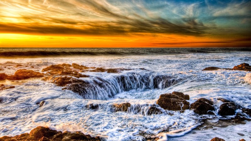 Ocean waves at sunset