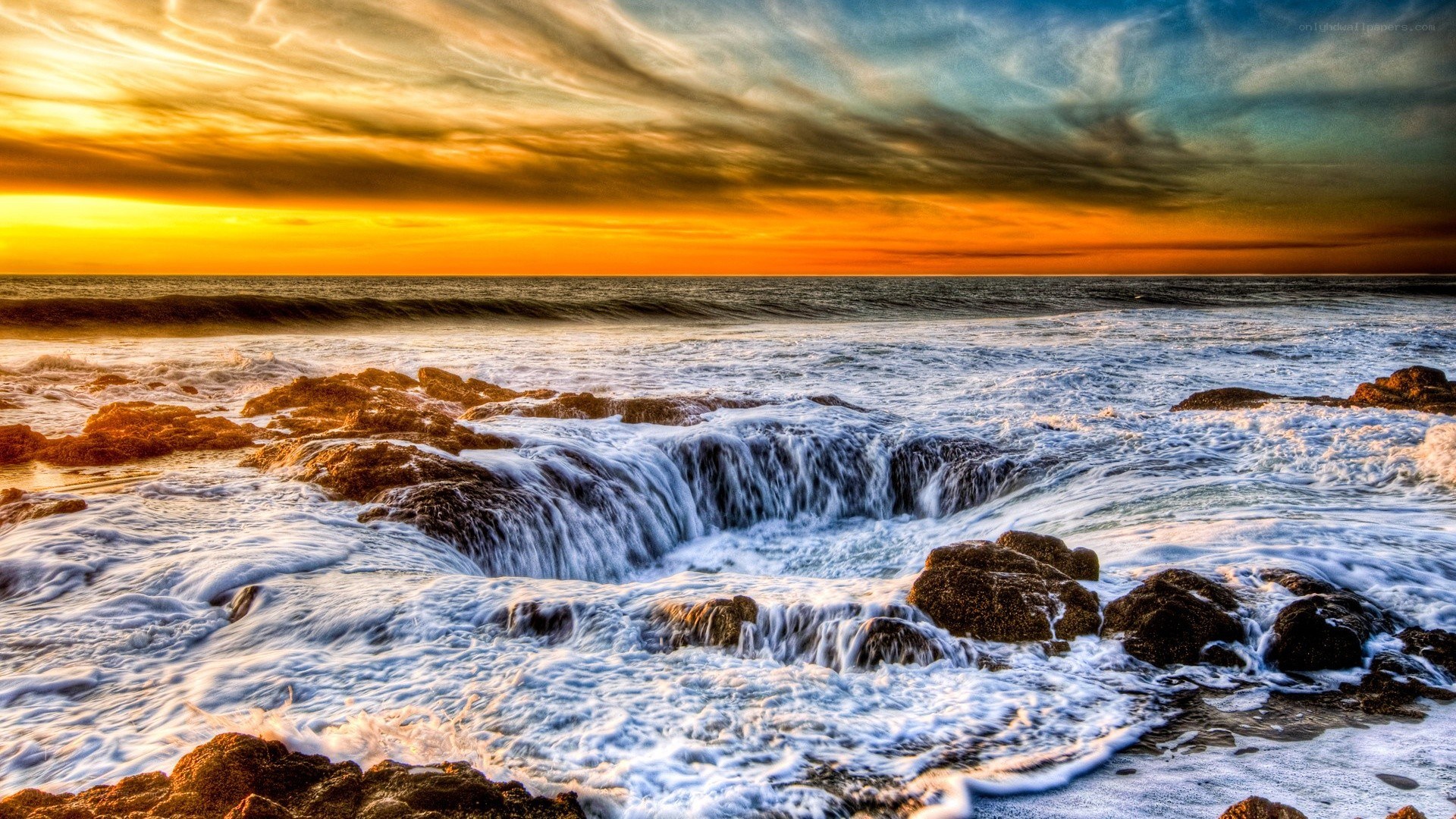 Ocean waves at sunset