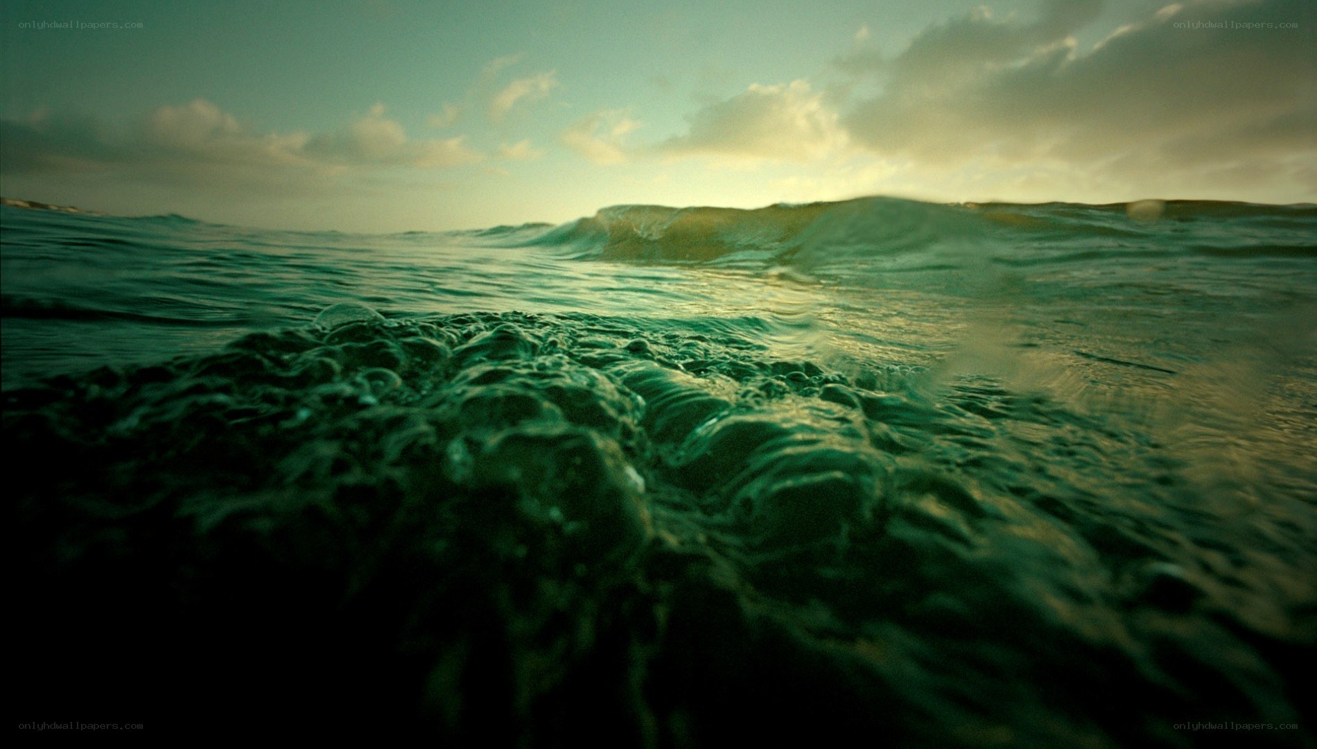 ocean waves at sunset