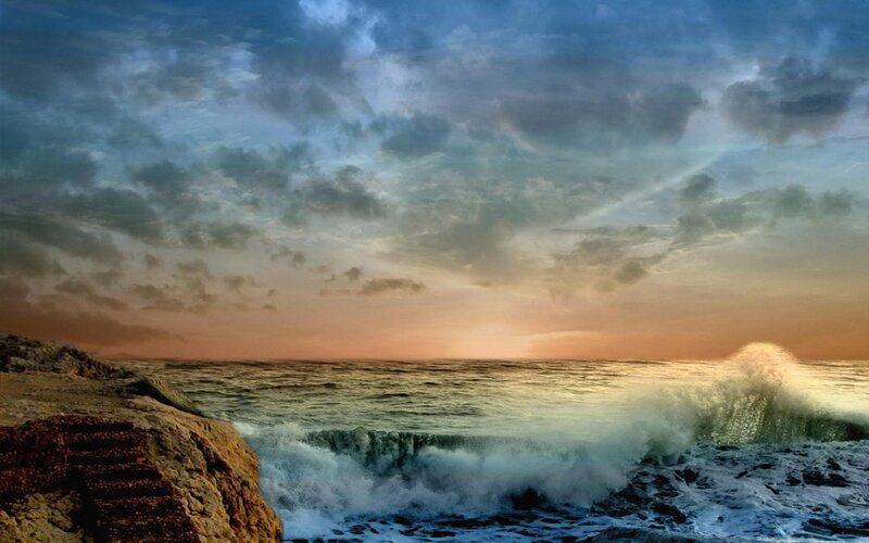 Ocean waves at sunset