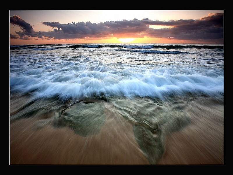 Ocean waves at sunset