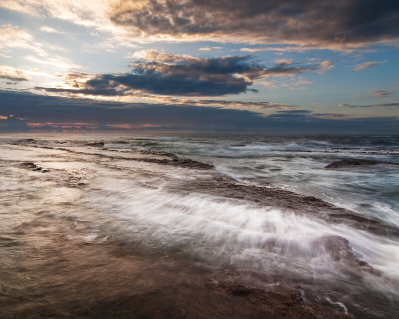 Ocean waves at sunset