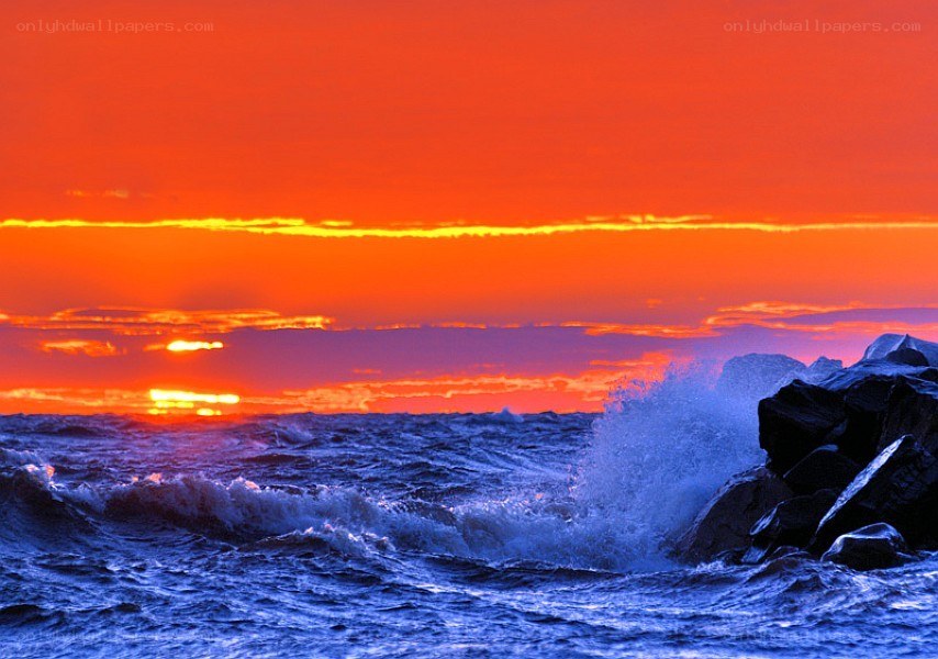Ocean waves at sunset