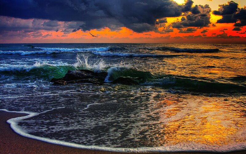 Ocean waves at sunset