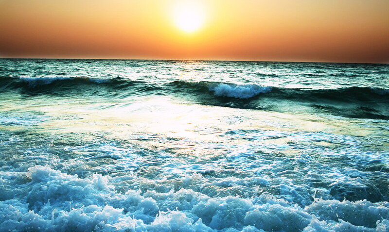Ocean waves at sunset