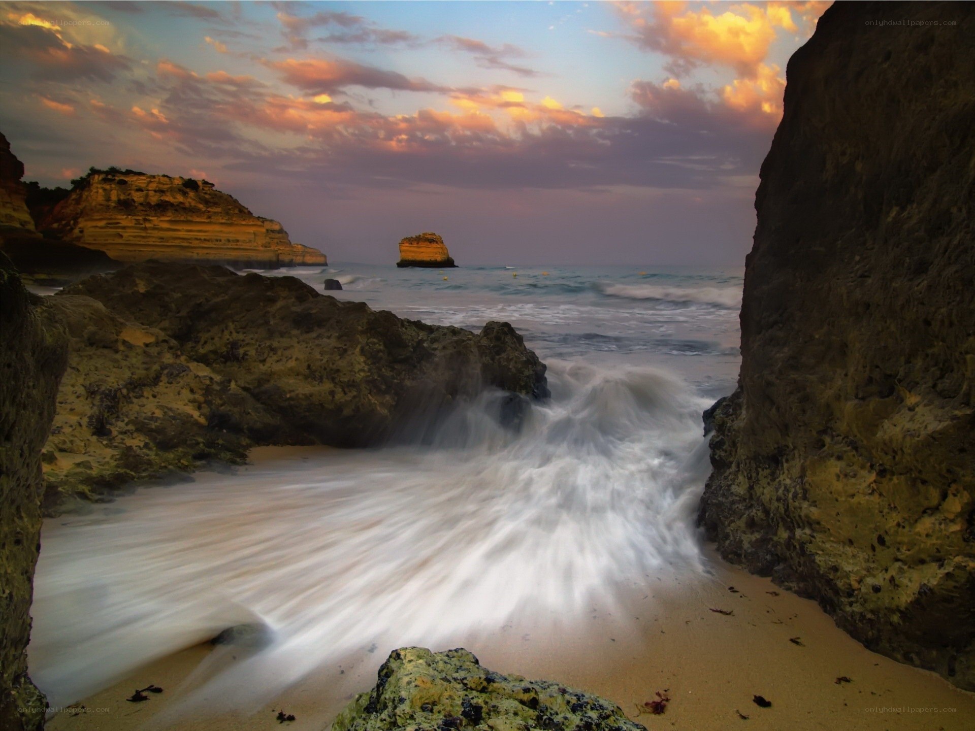 Ocean waves at sunset