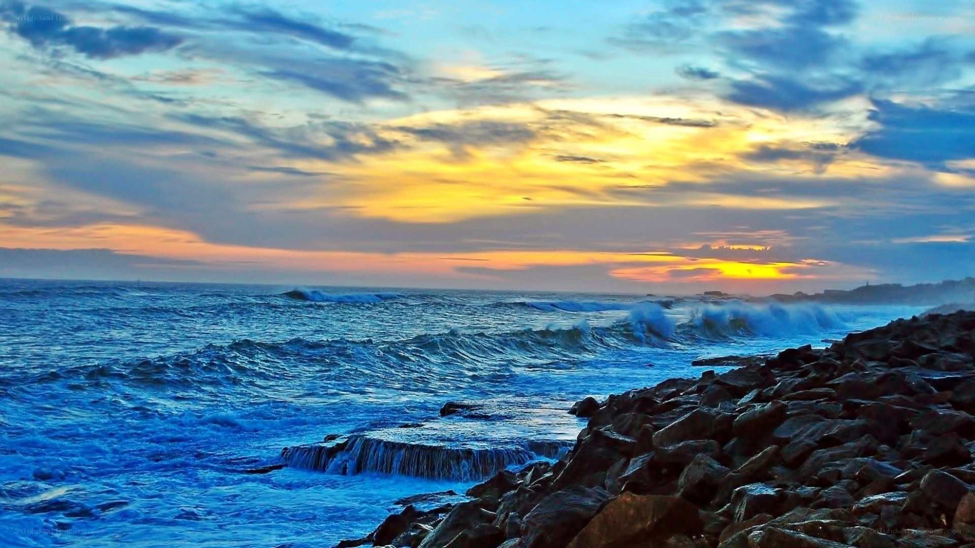 Ocean waves at sunset
