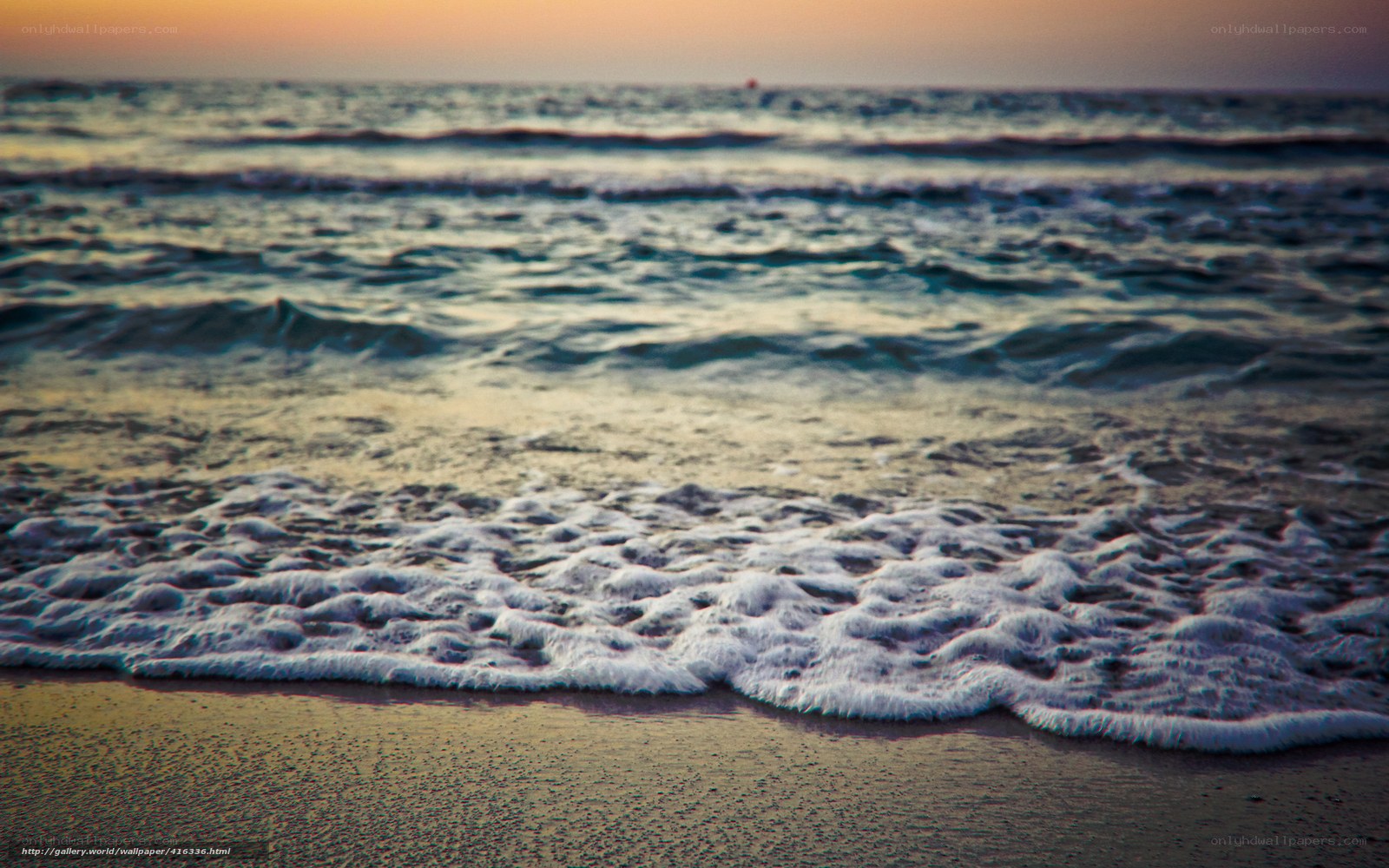 Ocean waves at sunset