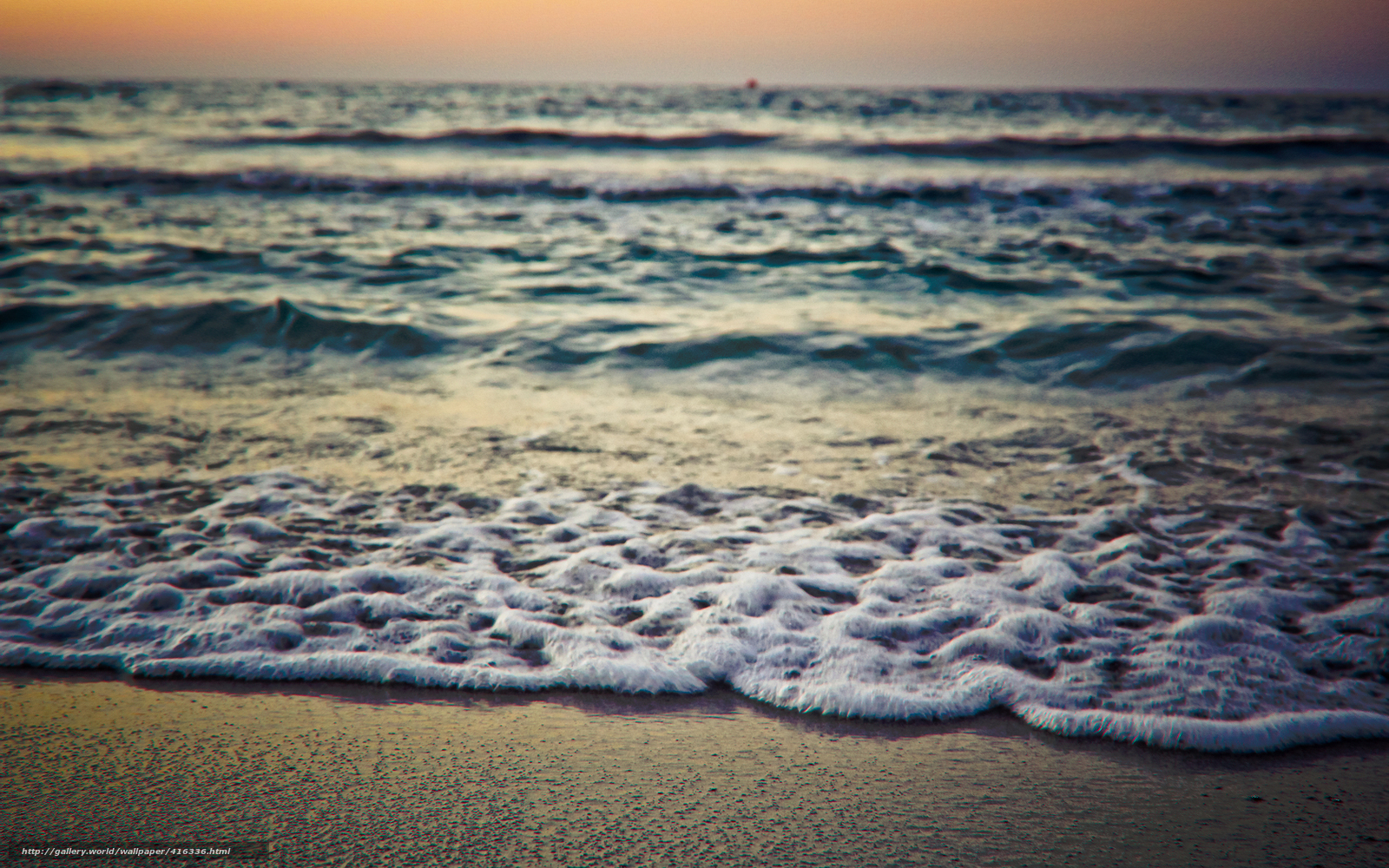 Ocean waves at sunset
