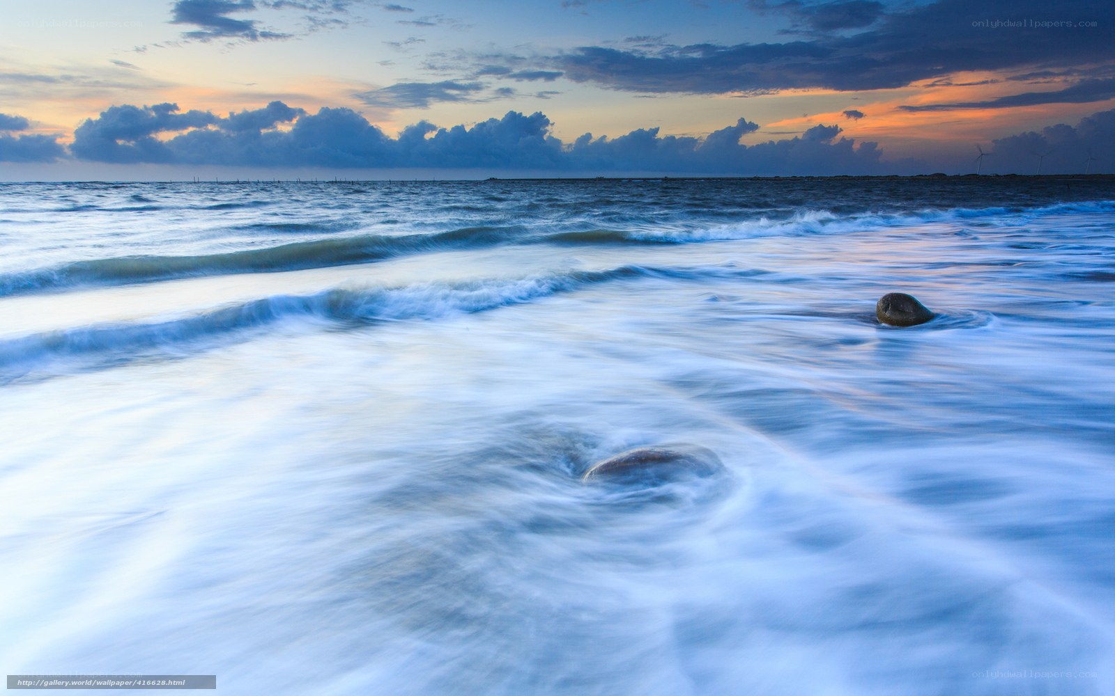 Ocean waves at sunset